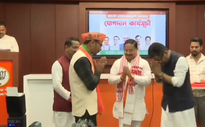 Durga Konwar, former TAHUX leader, officially joining BJP in Digboi, Assam, while being welcomed by party members with a saffron scarf.