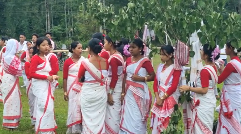 Moran community girls performing traditional Bihu dance in ethnic attire at the historic Gachtal Bihu celebration in Kakopathar, Tinsukia, Assam.